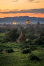 Pagoda landscape of Bagan in misty morning,under a warm sunrise in the plain of Bagan. Royalty Free Stock Photo