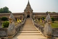 Pagoda at the main entrance of Wat Prathat Lampang Luang, an ancient Buddhist temple. Royalty Free Stock Photo