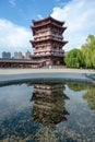 Pagoda and reflection in water in Xi`an Tang paradise park
