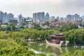 Pagoda on a stone boat with dragon sculptures aerial view in Xi`an Tang paradise park