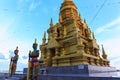 Pagoda yellow gold at Wat Laem Sor of the Buddhist seaside sky b