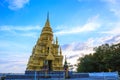 Pagoda yellow gold at Wat Laem Sor of the Buddhist seaside sky b