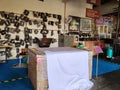 Pahang, Malaysia - 3 NOVEMBER 2021 : Batik block workshop interior with various tools and cloth in stamping process.