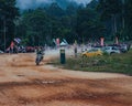 Enduro bike rider practice with spectators around