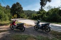 Two rental motorbikes on the side of the mountain road. Mae Hong Son Loop, in Northern Thailand Royalty Free Stock Photo