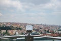 Paid binoculars on the observation deck on the background of the city