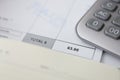 Paid goods and calculator on counting paper for time-based payments in Business finance office Royalty Free Stock Photo