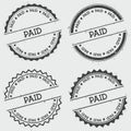 Paid insignia stamp isolated on white background. Royalty Free Stock Photo