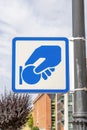 Paid parking payment road sign. On a gray iron rusty post on a city street Royalty Free Stock Photo
