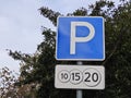 paid parking sign close-up
