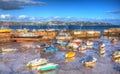 Paignton harbour Devon England uk in colourful HDR with boats and view to Torquay