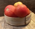 Pail tomatoes on bamboo bowl Royalty Free Stock Photo