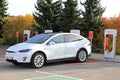 White Tesla Model X Electric SUV at Supercharger Royalty Free Stock Photo