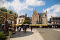 PAIMPOL, FRANCE, AUGUST 2023 - The old carousel and typical buildings in the center of Paimpol, Brittany, France