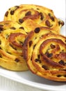 Pain au Raisin, Sweet bread against White Background