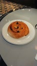 Pain au raisin on a white plate