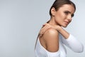 Pain In Body. Beautiful Woman Feeling Pain In Neck And Shoulders Royalty Free Stock Photo