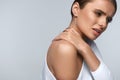 Pain In Body. Beautiful Woman Feeling Pain In Neck And Shoulders Royalty Free Stock Photo