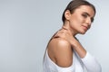 Pain In Body. Beautiful Woman Feeling Pain In Neck And Shoulders Royalty Free Stock Photo