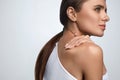 Pain In Body. Beautiful Woman Feeling Pain In Neck And Shoulders Royalty Free Stock Photo