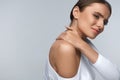 Pain In Body. Beautiful Woman Feeling Pain In Neck And Shoulders Royalty Free Stock Photo