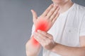 Pain In Hand, Carpal Tunnel Syndrome On Gray Background