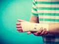 Man with painful bandaged hand. Royalty Free Stock Photo