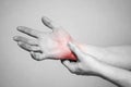 Pain in the joints of the hands. Carpal tunnel syndrome. Hand injury, feeling pain. Health care and medical concept Royalty Free Stock Photo