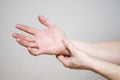 Pain in the joints of the hands. Carpal tunnel syndrome. Hand injury, feeling pain. Health care and medical concept Royalty Free Stock Photo