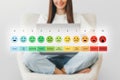 pain measurement scale. Colorful set of emotion icons. A girl with a laptop checks her mood scale Royalty Free Stock Photo