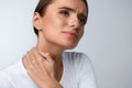 Pain In Neck. Beautiful Woman Having Painful Feeling, Body Pain Royalty Free Stock Photo