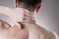 Pain in the neck. Man with backache. Pain in the man's body Royalty Free Stock Photo