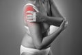 Pain in shoulder, care of female hands, ache in woman`s body Royalty Free Stock Photo