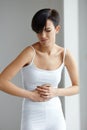 Pain In Stomach. Beautiful Woman Feeling Abdominal Pain. Health Royalty Free Stock Photo