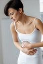 Pain In Stomach. Beautiful Woman Feeling Abdominal Pain. Health Royalty Free Stock Photo