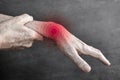 Pain in wrist joint of Asian elder man. Concept of hand pain, rheumatoid arthritis and arm problems Royalty Free Stock Photo