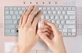 Painful finger while prolonged use of computer keyboard Royalty Free Stock Photo