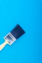 Paint brush on blue colour background Royalty Free Stock Photo