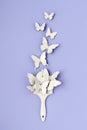 Paint brush dried bright butterflies lavender color background with copy space