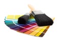 Paint brush and multi coloured swatches Royalty Free Stock Photo