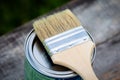 Paint brush placed on top of a can Royalty Free Stock Photo