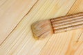 Paint brush with Shellac oil paint on wood Royalty Free Stock Photo