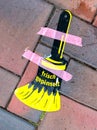 Paint brush symbol on a sidewalk for freshly painted objects. Text: freshly painted - frisch gestrichen Royalty Free Stock Photo