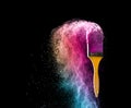 paint brushes with abstract powder color explosion isolated on b