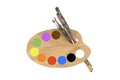 Paint brushes, colors and artist palette Royalty Free Stock Photo