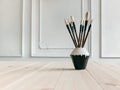 Paint brushes on desk Royalty Free Stock Photo