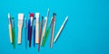 Paint brushes new clean isolated against blue background Royalty Free Stock Photo