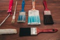 Paint brushes on the old wooden background Royalty Free Stock Photo