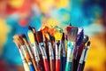 Paint brushes and paints on the background of the school palette, Colorful artist brushes and paint, AI Generated Royalty Free Stock Photo