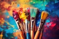 Paint brushes and palette of paints on a colorful abstract background, Colorful artist brushes and paint, AI Generated Royalty Free Stock Photo